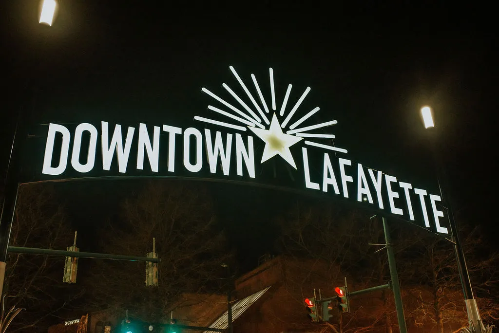 Photo of Downtown Lafayette sign at night,